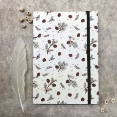 Tečkovaný zápisník s borovými šiškami