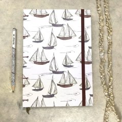 Tečkovaný zápisník s plachetnicemi + kolekce samolepek Papuchalk