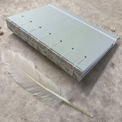 Tečkovaný zápisník zelenkavý s větvičkami