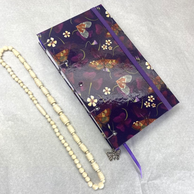 Cestovatelský tečkovaný zápisník s trojlístky