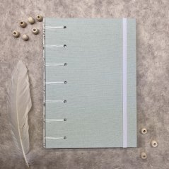 Tečkovaný zápisník zelenkavý s větvičkami