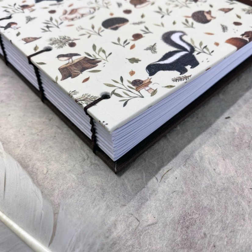 Tečkovaný zápisník se zvířátky