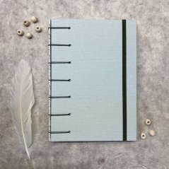 Tečkovaný zápisník zelenkavý se sněženkami