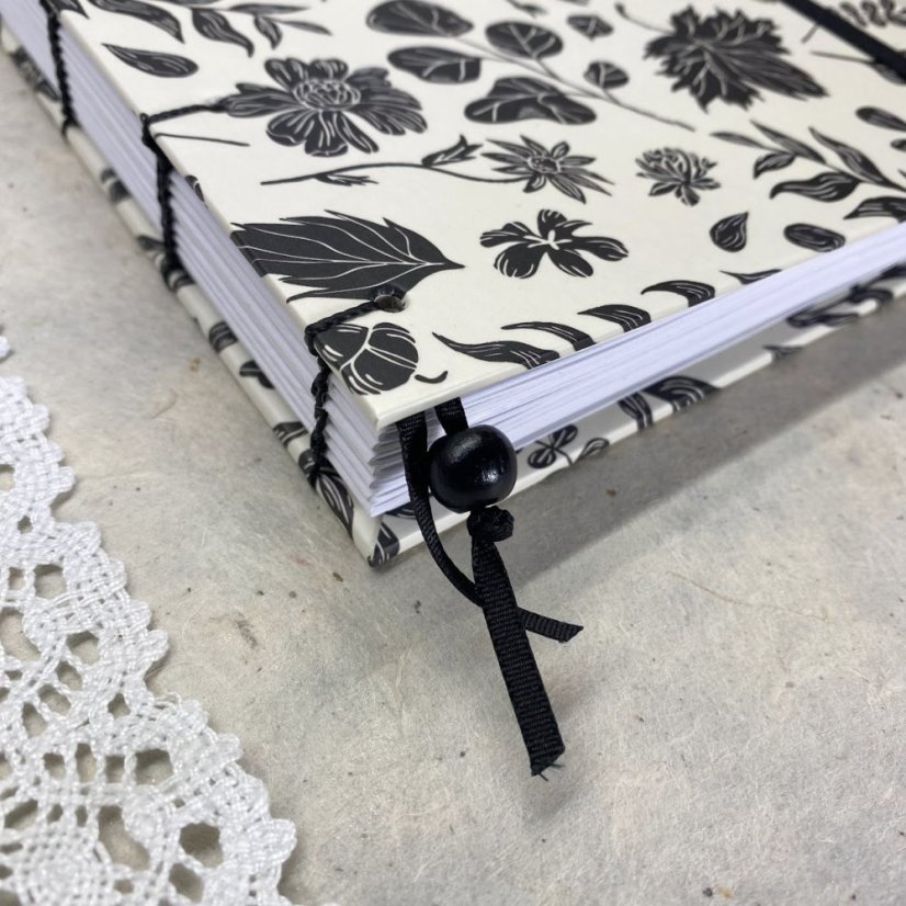 Tečkovaný zápisník černý s ptákem