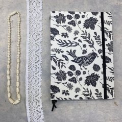 Tečkovaný zápisník černý s ptákem