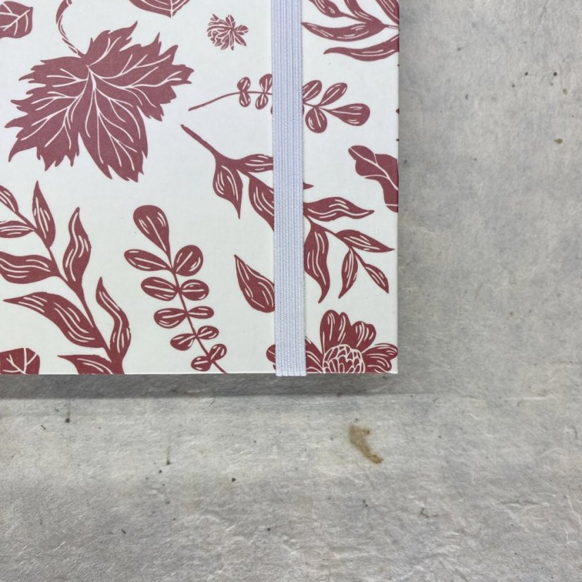 Tečkovaný zápisník červený s ptákem