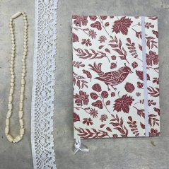 Tečkovaný zápisník červený s ptákem