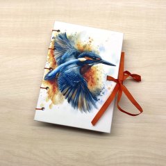 Tečkovaný deník A6: ledňáček na oranžové s mašlí