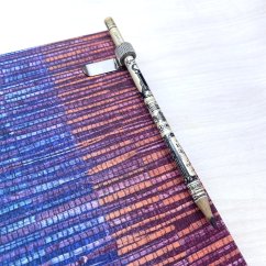 Kovová sponka na tužku